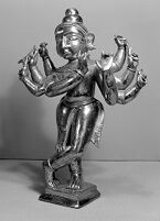 view M0012571 / M0012572: Figure of Krishna and a copper figure of Vishnu