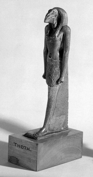 M0011113: Figure of the Egyptian Moon God Thoth / M0011114: Bronze figure of the Egyptian deity Bes, protector of childbirth