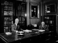 view M0013824: Edgar Ashworth Underwood and Armand Donald Lacaille in the Director's Room at the Wellcome Historical Medical Museum