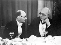 view M0015259: Photograph of Sir Allen Daley talking to Sir Arthur Rucker, 1947