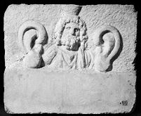 view M0015212: Marble votive plaque with relief bust, possibly Serapis, a Greco-Egyptian deity, 1st-3rd century A.D.