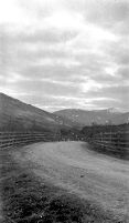 view M0015463: View of snow-capped hills from railway bridge in Glanfalloch, Perthshire, 1927