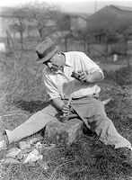 view M0015972: Leon Coutier demonstrating the production of blades by the use of the hammer and punch method