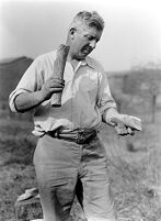 view M0015973: Leon Coutier making a hand-axe by baton technique
