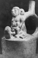 view M0016585: Peruvian vessel with a woman in childbirth with a midwife assisting carved on the handle